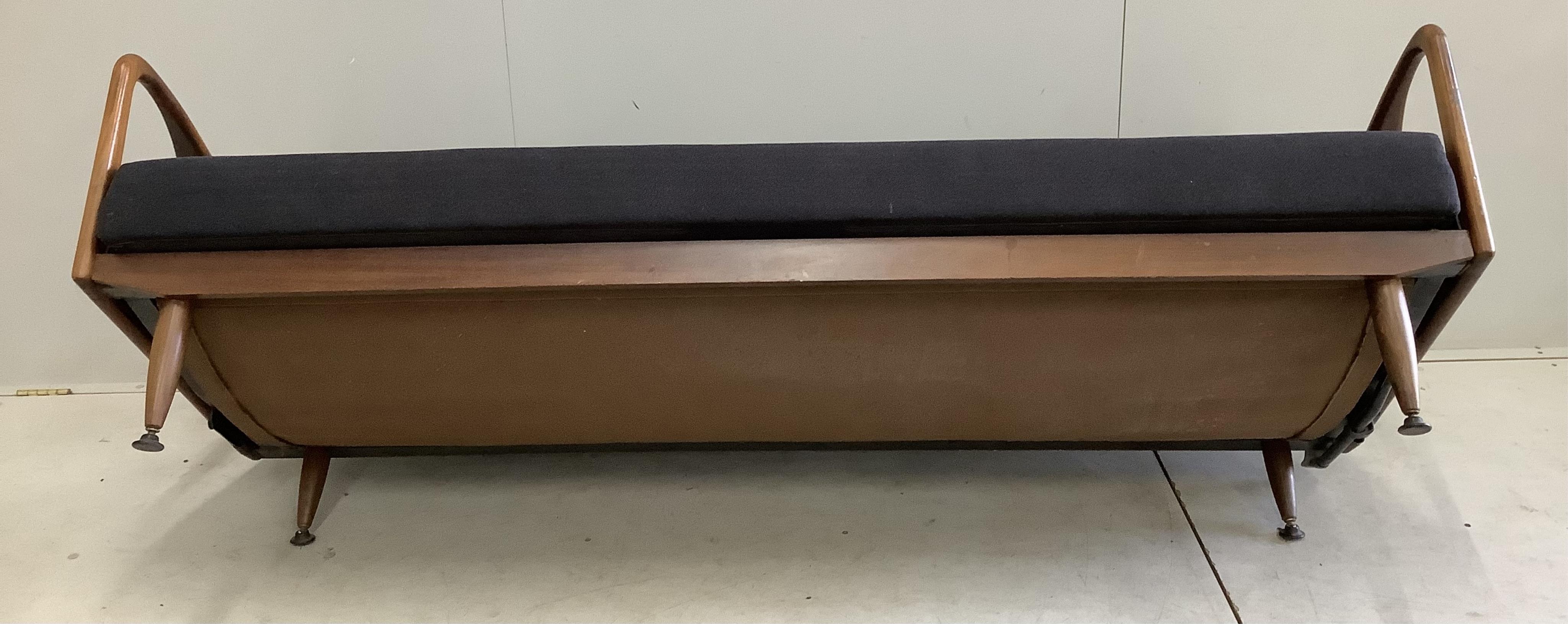 A mid century Greaves and Thomas teak sofa bed, width 200cm, depth 79cm, height 72cm. Condition - good